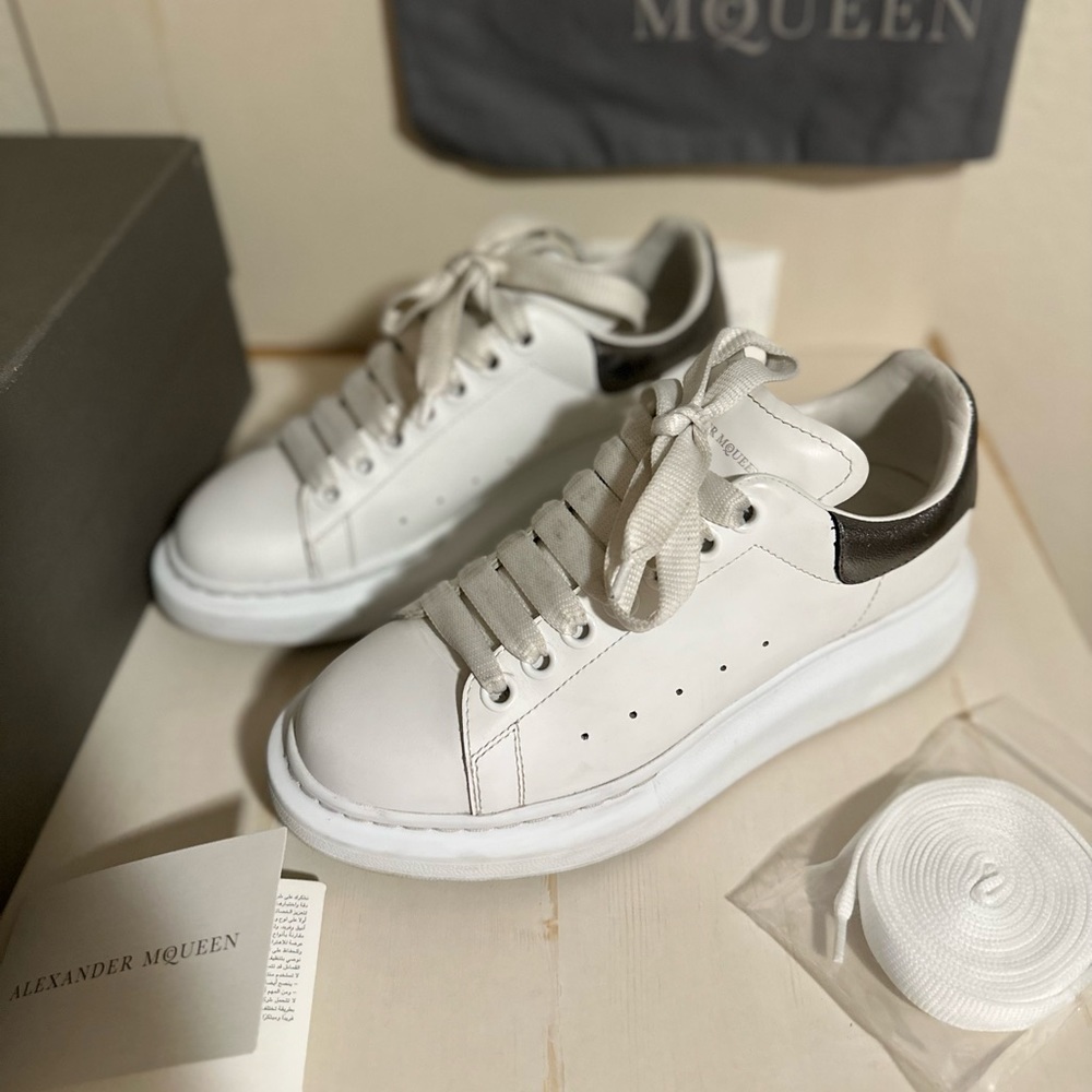 Alexander McQueen Oversized white/silver metallic sneakers in size 37